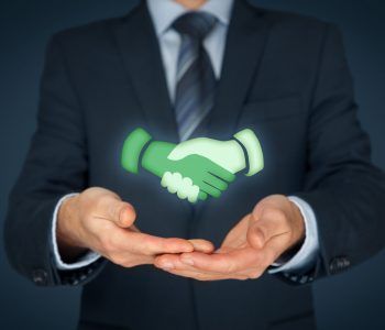 Business cooperation and win-win concept. Businessman and symbol of handshake.